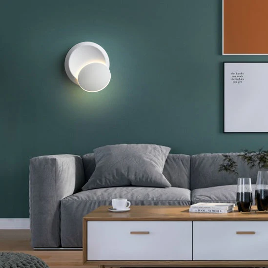 Skanto | Moderne nordische runde Eclipse LED-Wandleuchte aus Eisen, drehbar für Nachttisch