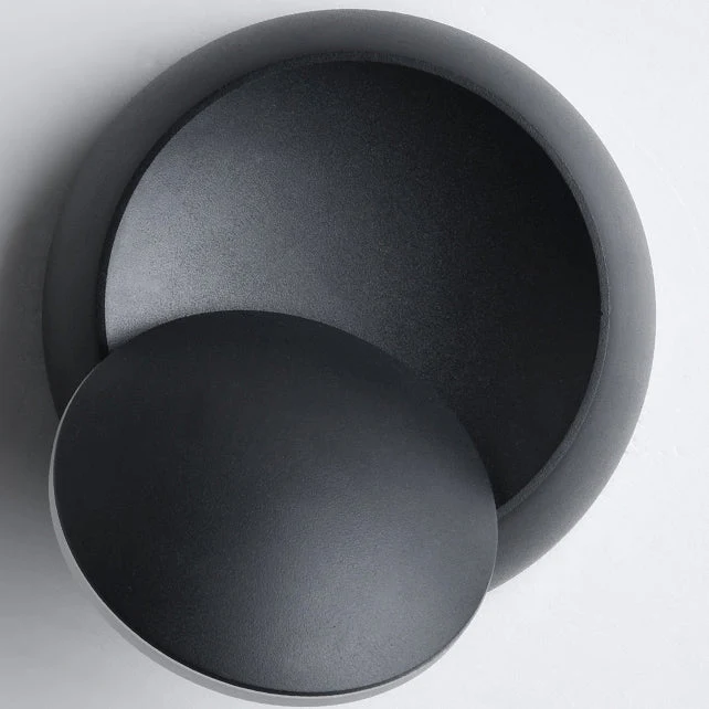 Skanto | Moderne nordische runde Eclipse LED-Wandleuchte aus Eisen, drehbar für Nachttisch