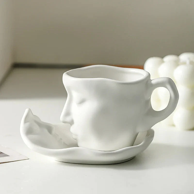 Skanto | Kyssnades Gesichts-Keramik-Kaffeetasse