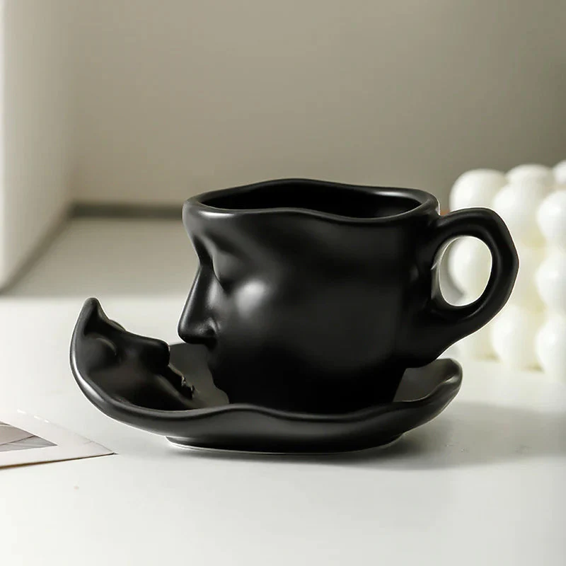Skanto | Kyssnades Gesichts-Keramik-Kaffeetasse