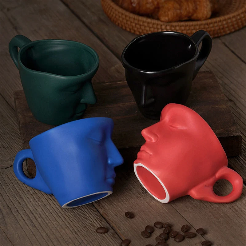 Skanto | Kyssnades Gesichts-Keramik-Kaffeetasse