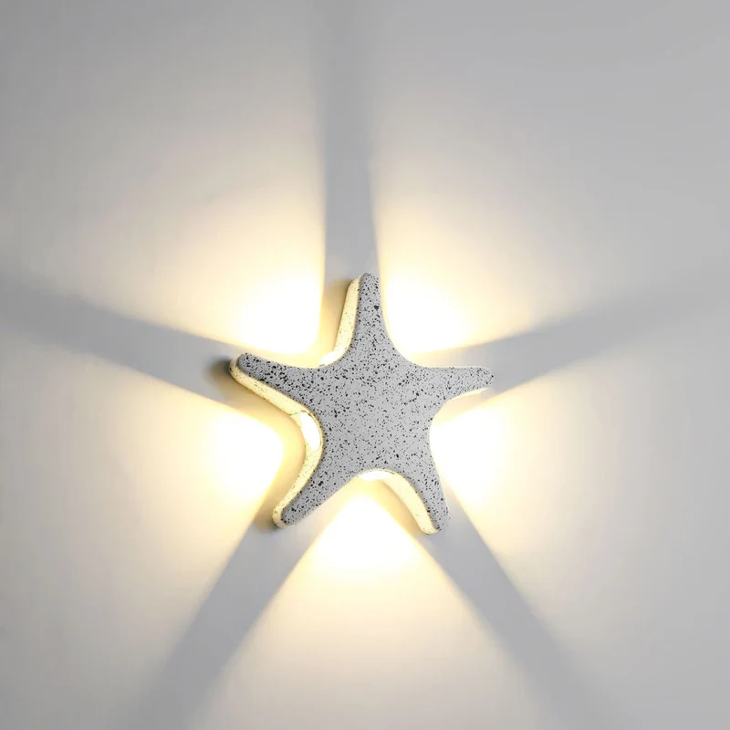 Skanto | Zeitgenössische schlichte LED-Wandleuchte im Seestern-Design aus Aluminium, wasserdicht für die Terrasse im Außenbereich