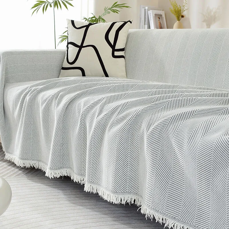 Skanto | Chenille-Überwurf mit Fischgrätmuster und Quasten für Sofas