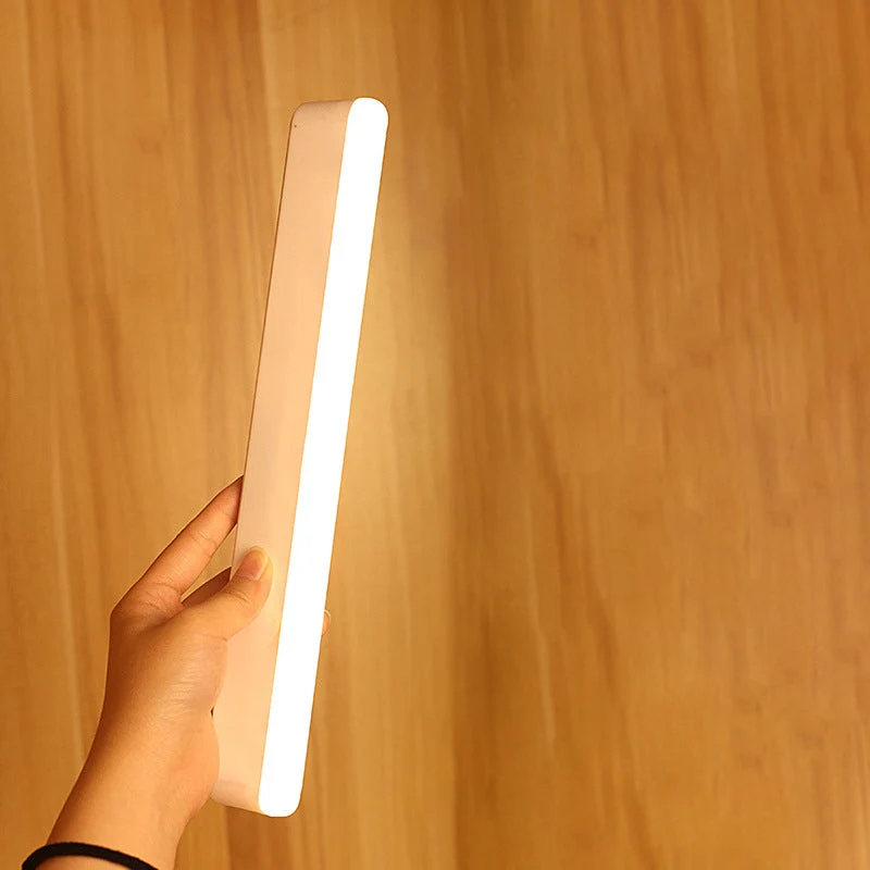 Skanto | Moderne Minimalistische Wiederaufladbare Magnetische Saug-Kunststoffstreifen Rechteckige LED Wandlampe Nachtlicht für Arbeitszimmer