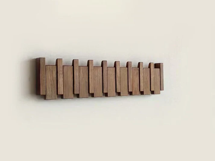 HarmonyCoat™ | Wandgarderobe im Piano-Design