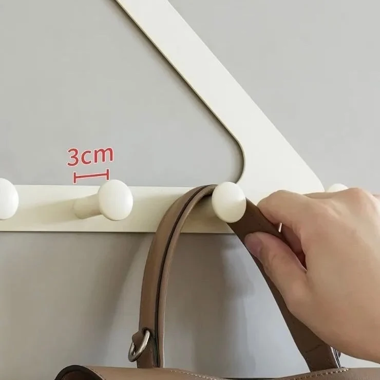 GripNest™ | Bohrfreier Wandhaken mit platzsparendem Design