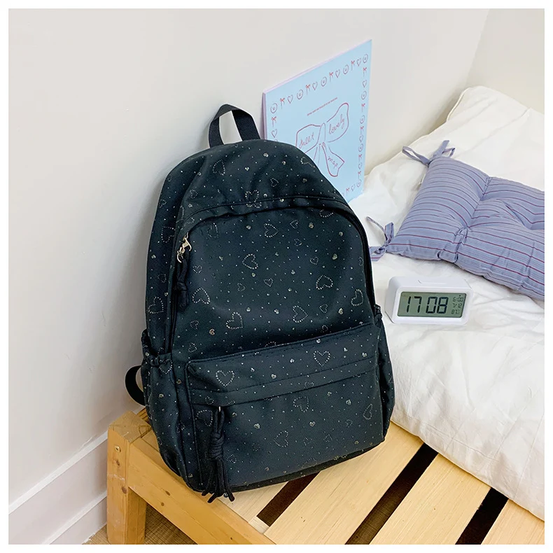 Lässiger Schulrucksack mit Herzmuster