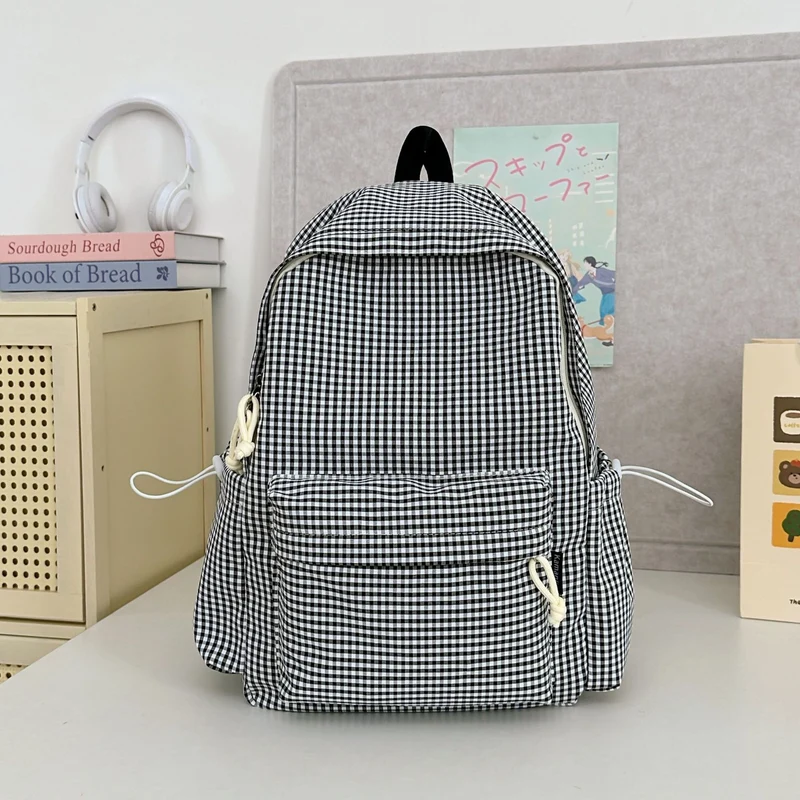 Schulrucksack mit Vichy-Muster und Charakter-Applikation