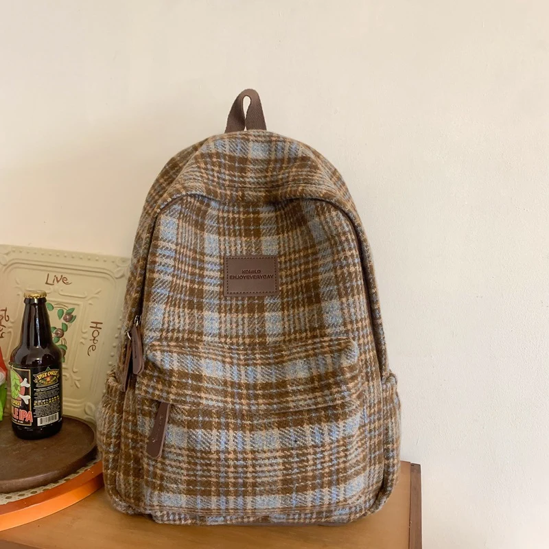 Funktionaler karierter Schulrucksack