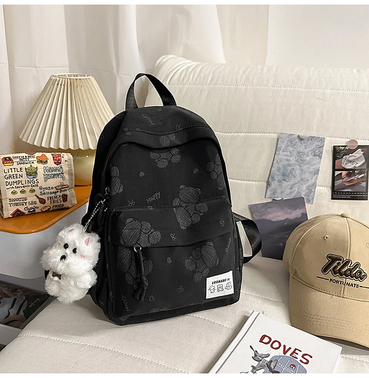 Niedlicher gemusterter Canvas-Schulrucksack