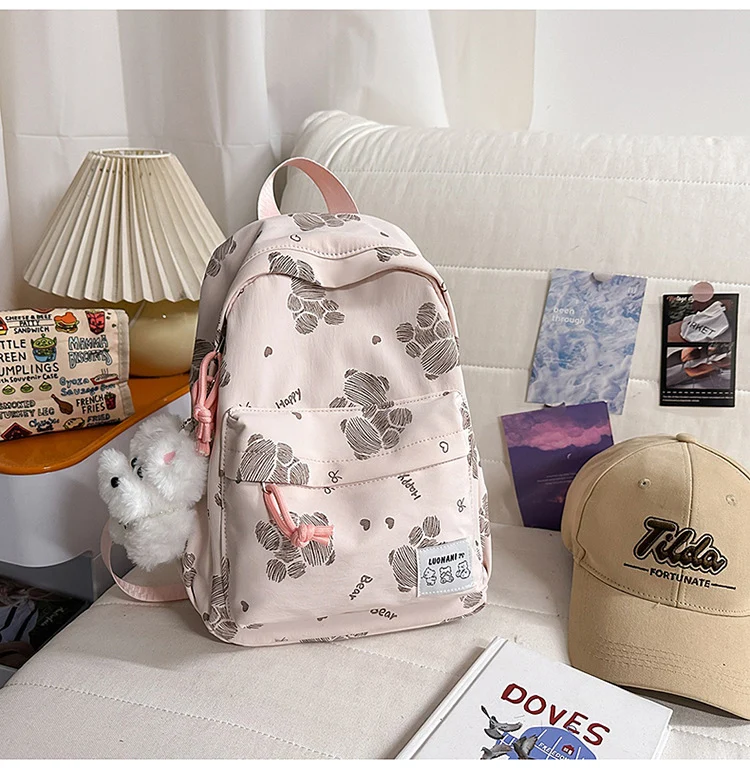Niedlicher gemusterter Canvas-Schulrucksack