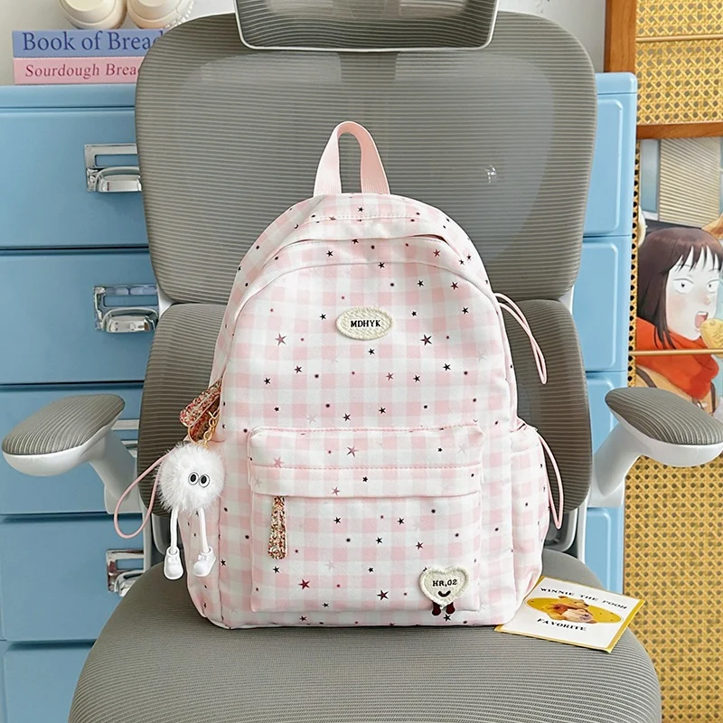 Niedlicher gemusterter Schulrucksack