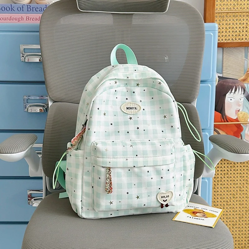 Niedlicher gemusterter Schulrucksack