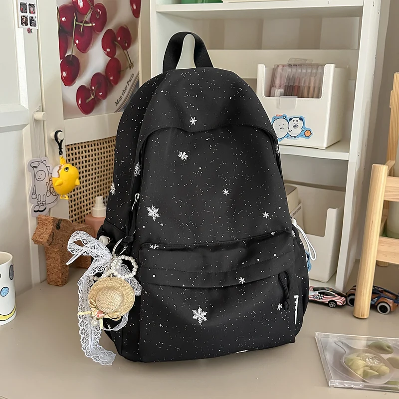 Lustiger Schulrucksack mit Themen-Verzierungen