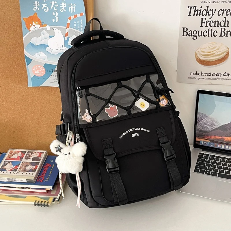 Kreativer Schulrucksack mit transparentem Panel