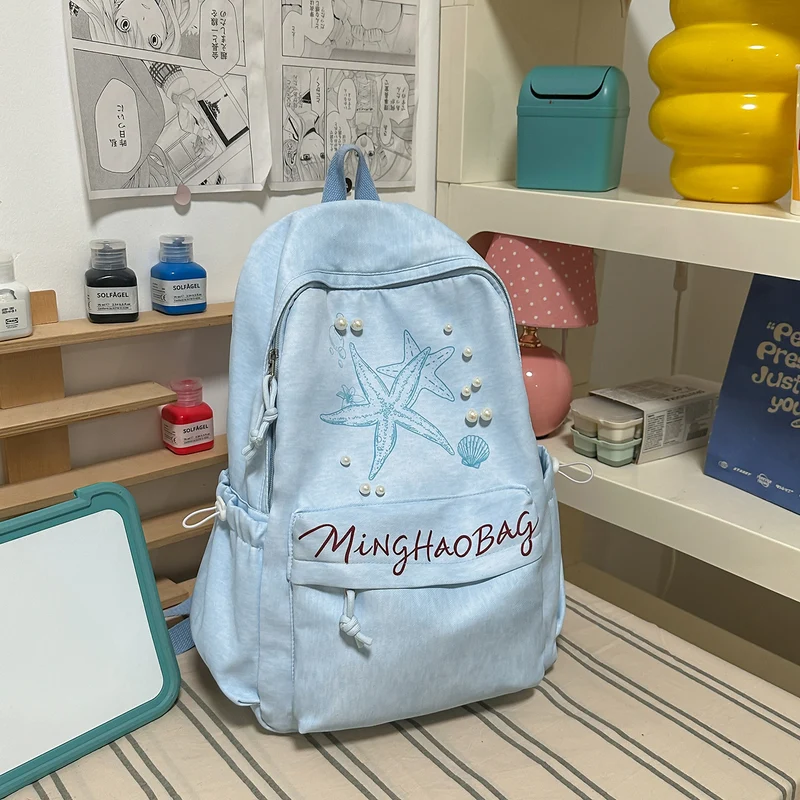Bestickter Schulrucksack mit Seestern-Design