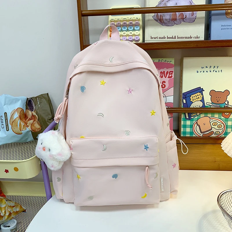 Bestickter Schulrucksack mit Stern- und Mondmuster
