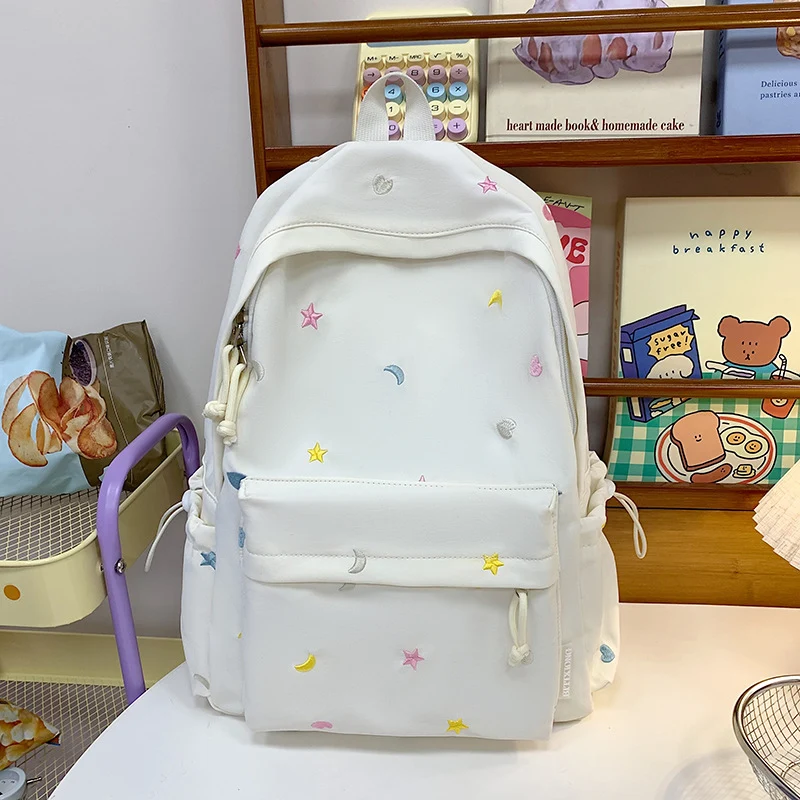 Bestickter Schulrucksack mit Stern- und Mondmuster