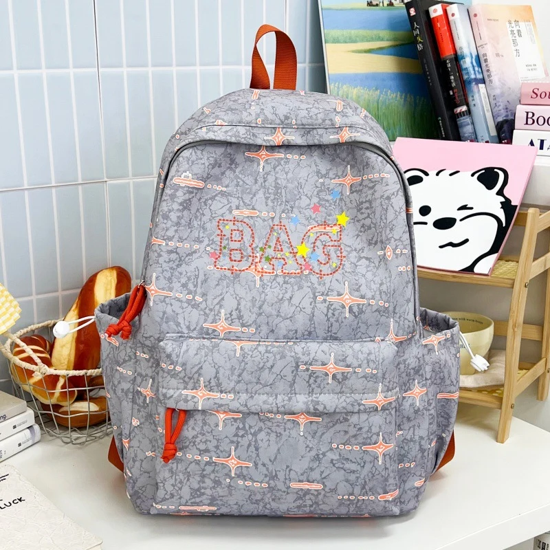 Lustiger gemusterter Schulrucksack