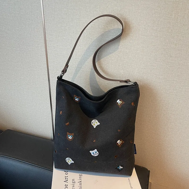 Lustiger Schulrucksack mit gesticktem Charakter
