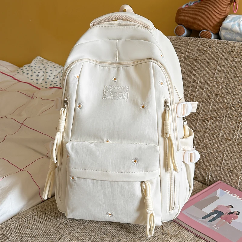 Eleganter Schulrucksack mit floralen Verzierungen