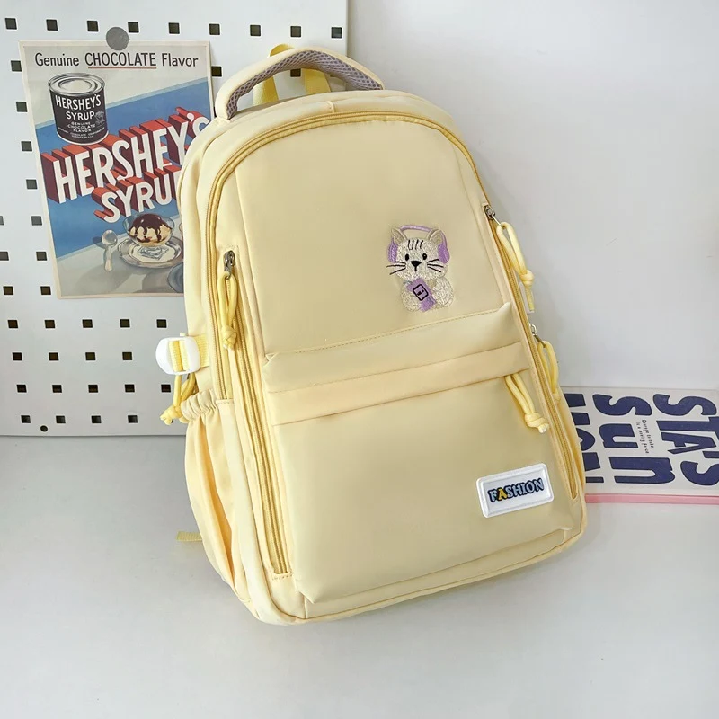 Niedliche Schultasche mit gesticktem Tiermotiv