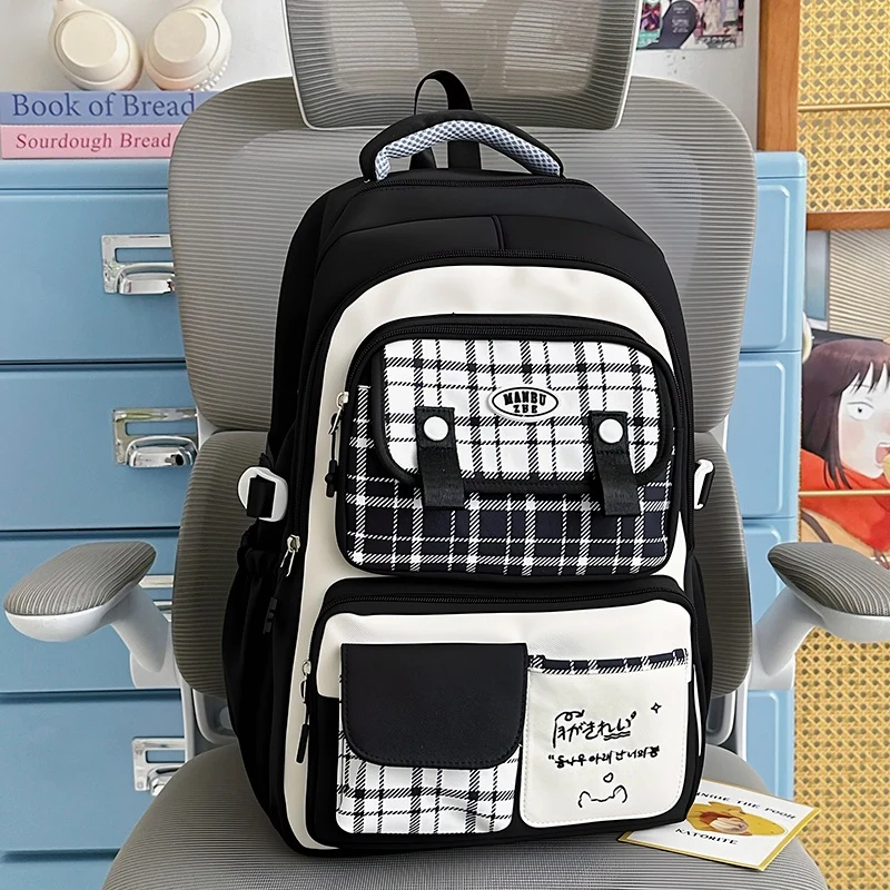 Karierter Schulrucksack
