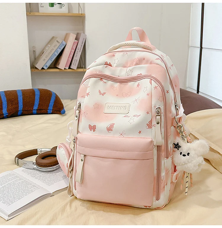 Schulrucksack mit Blumenmuster und mehreren Taschen