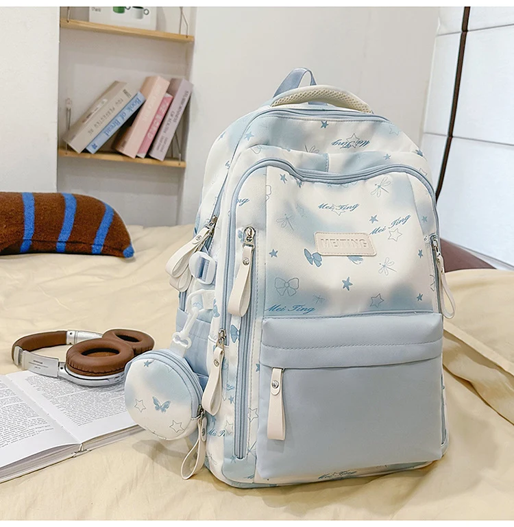 Schulrucksack mit Blumenmuster und mehreren Taschen