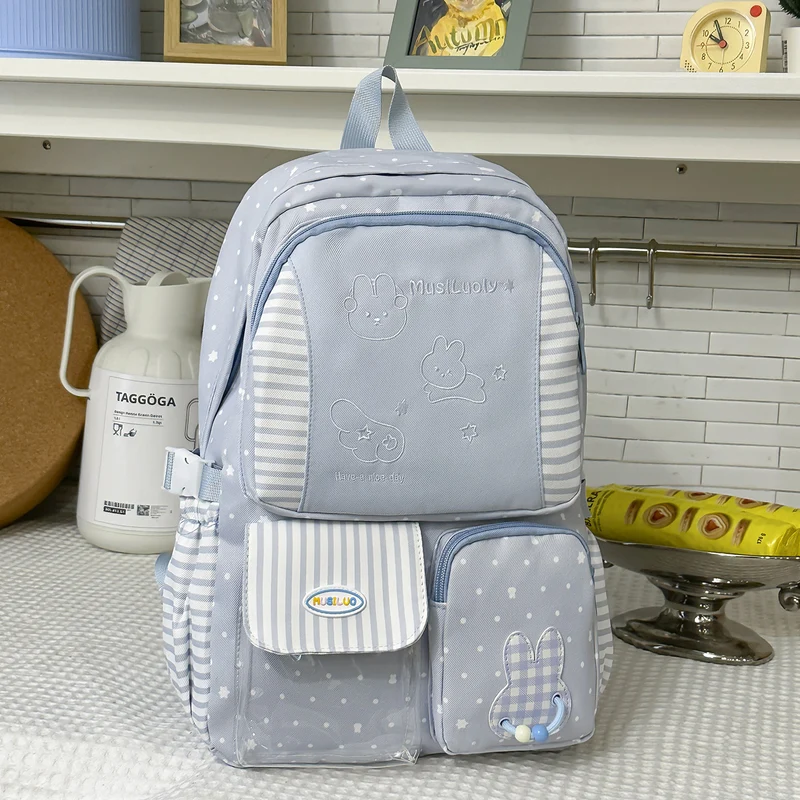 Schulrucksack aus Stoff mit niedlichem Charakter-Motiv