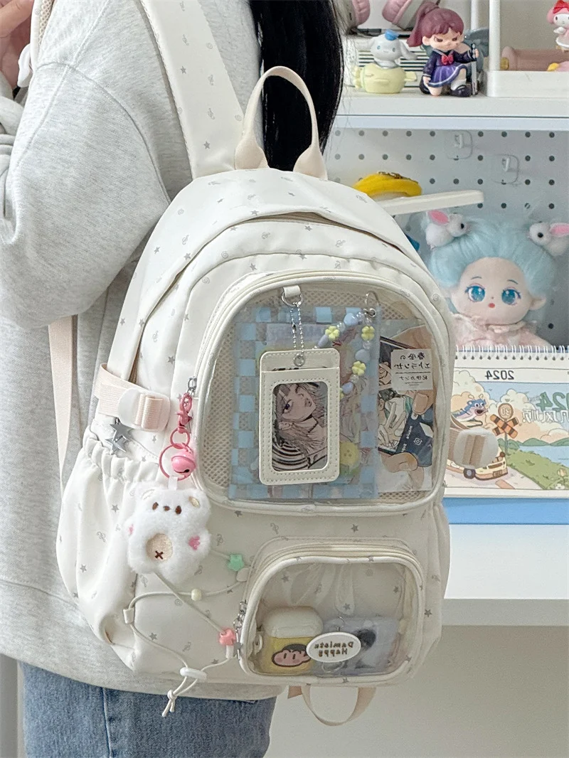Schulrucksack mit Anime-Charakter-Motiv und transparentem Fach