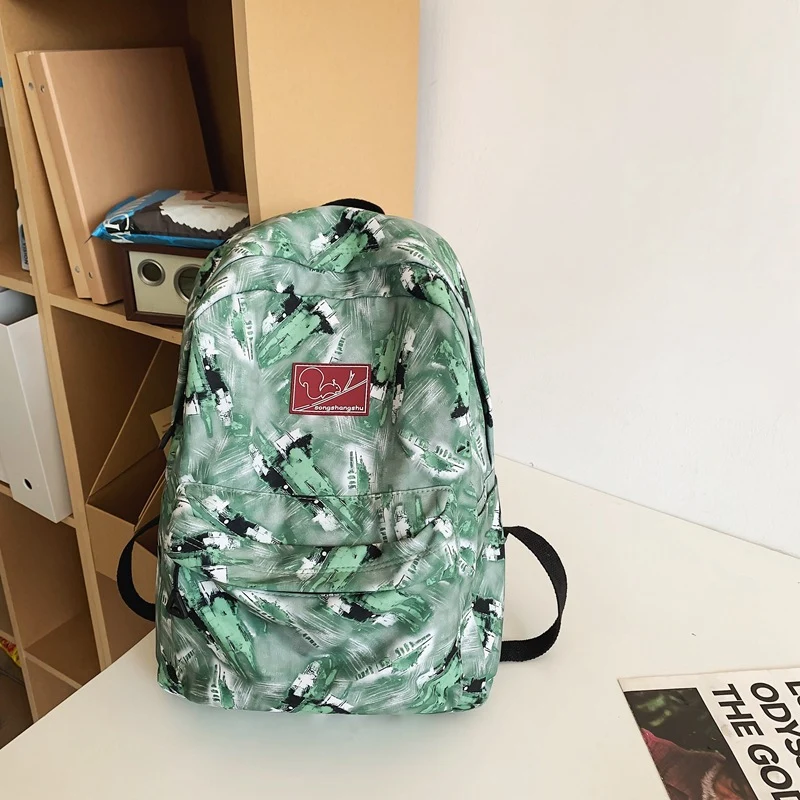 Multifunktionaler Schulrucksack mit abstraktem Print