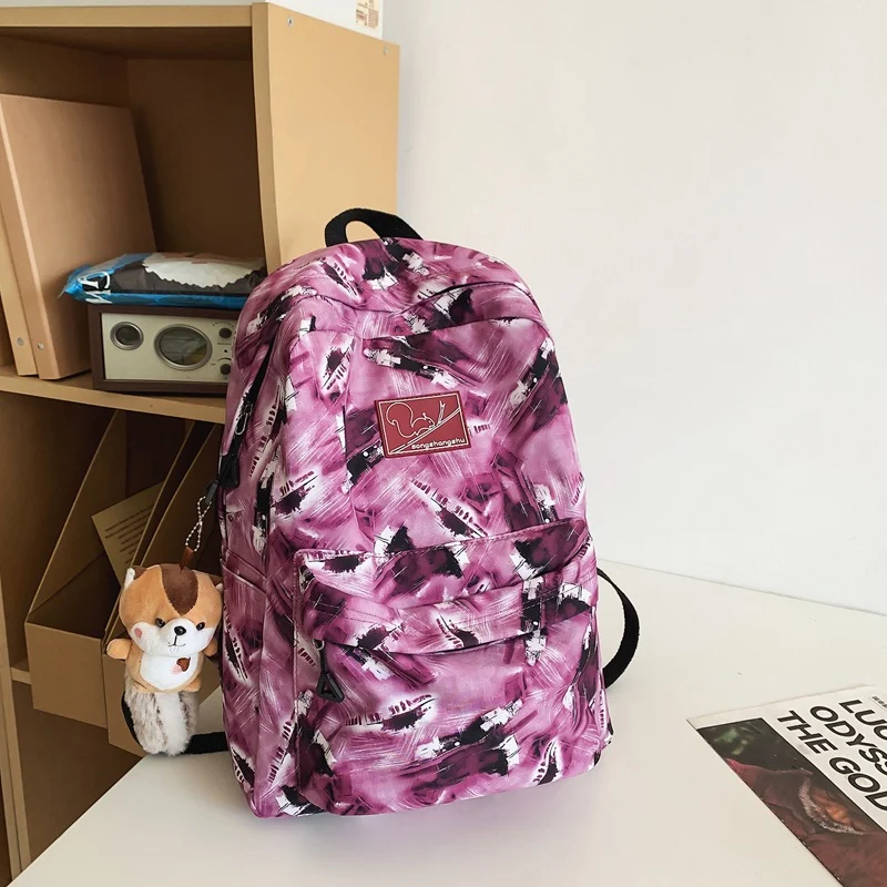 Multifunktionaler Schulrucksack mit abstraktem Print