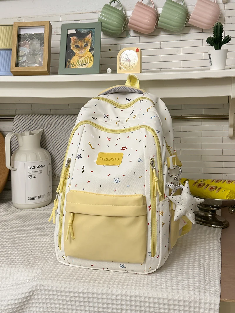 Vielseitiger gemusterter Schulrucksack