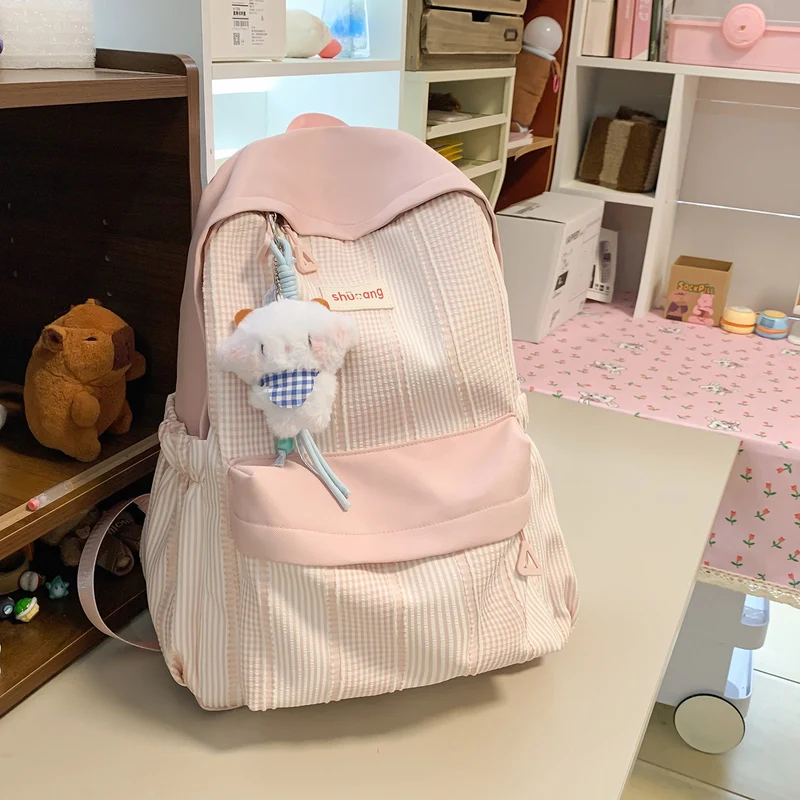 Vielseitiger karierter Schulrucksack