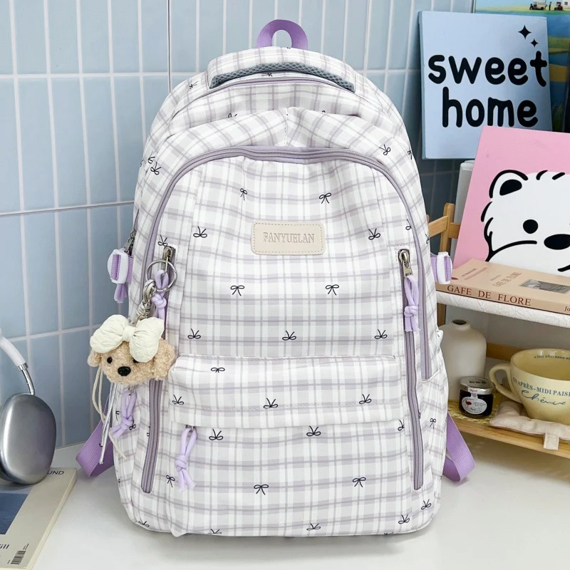 Süßer Schulrucksack mit Schleifenmuster
