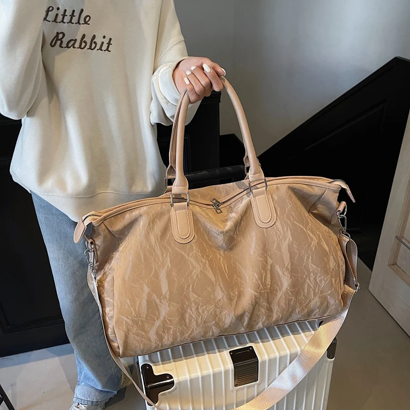 Sportliche Reisetasche mit isolierten und mehreren Tragemöglichkeiten Skanto