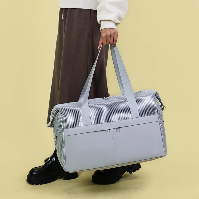 Sportliche Tragetasche mit atmungsaktivem Mesh und multifunktionalen Taschen Skanto