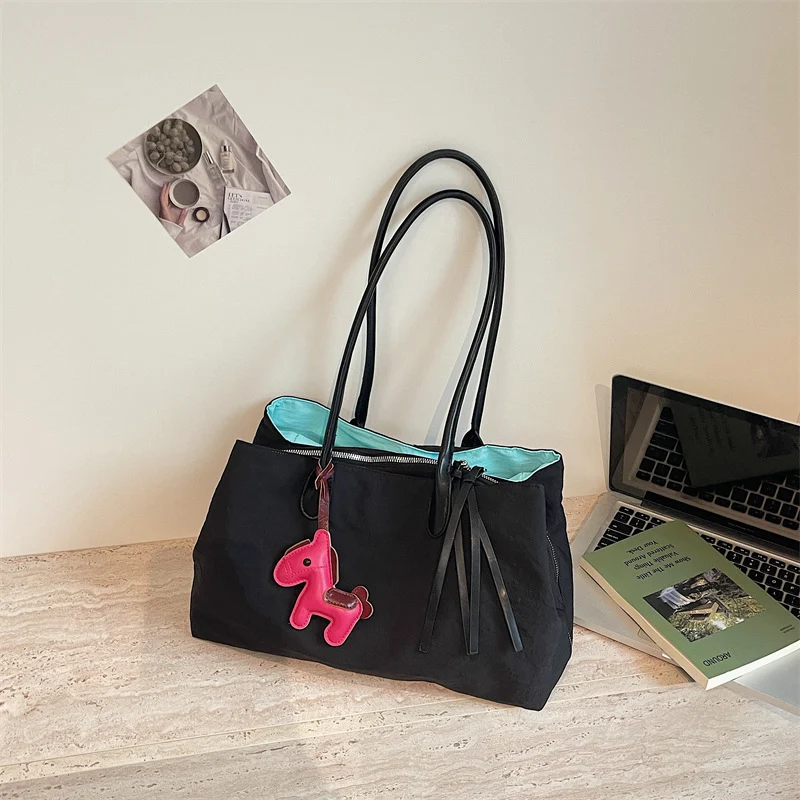 Elegante Handtasche mit Reißverschluss und praktischen Innentaschen Skanto