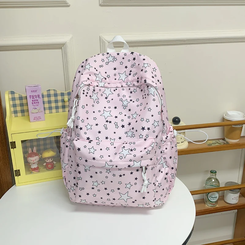 Rucksack Skanto mit Sternenprint und vielen Fächern