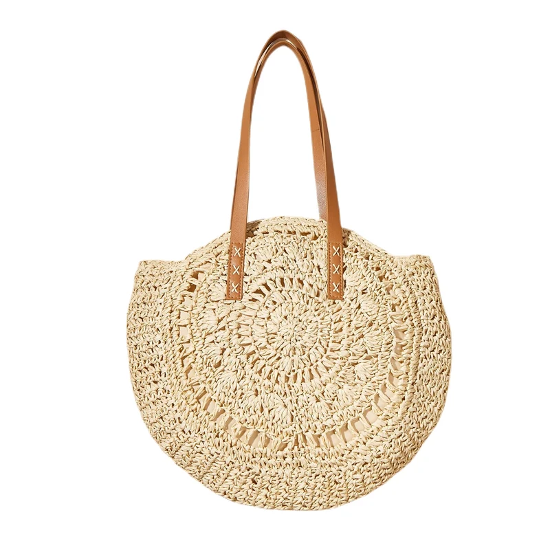 Handgefertigter runder Raffia-Korb mit eleganten Ledergriffen Skanto
