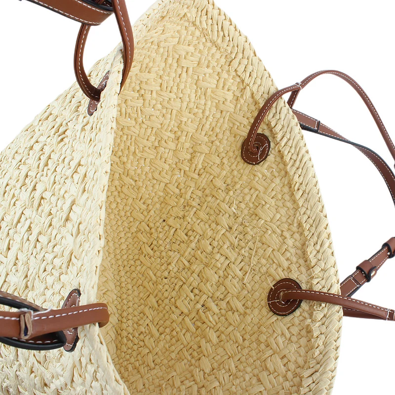 Elegante gewebte Handtasche aus Naturmaterial mit robusten Ledergriffen Skanto