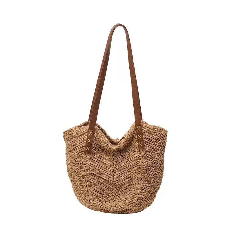 Handgefertigte Strandtasche aus Naturmaterial mit dekorativen Lederakzenten Skanto