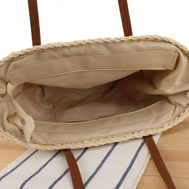 Moderne Strohtasche mit Lederdetails Skanto