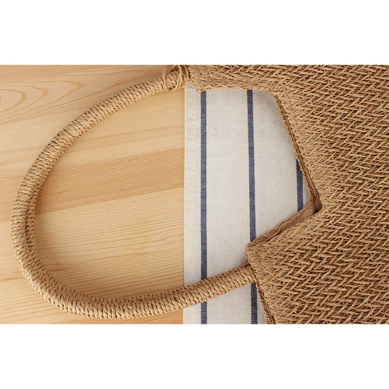 Moderne Strand-Einkaufstasche aus gewebtem Naturmaterial mit Fransen-Details Skanto