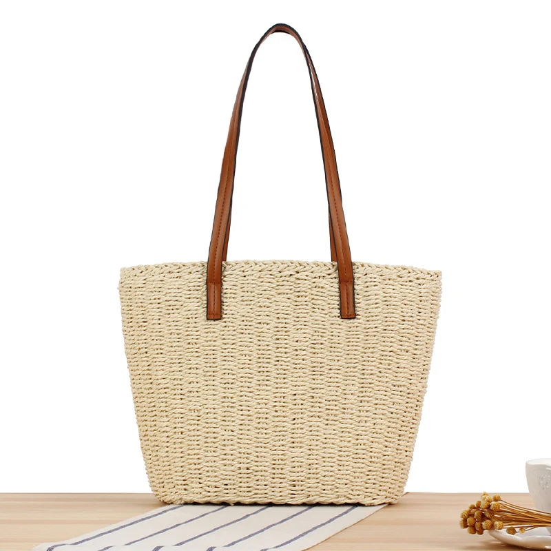 Handtasche aus Naturgeflecht mit Ledergriffen Skanto