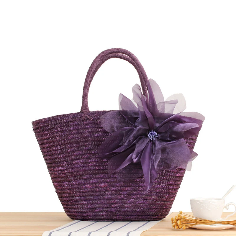 Elegante Strohtasche mit floralen Akzenten Skanto