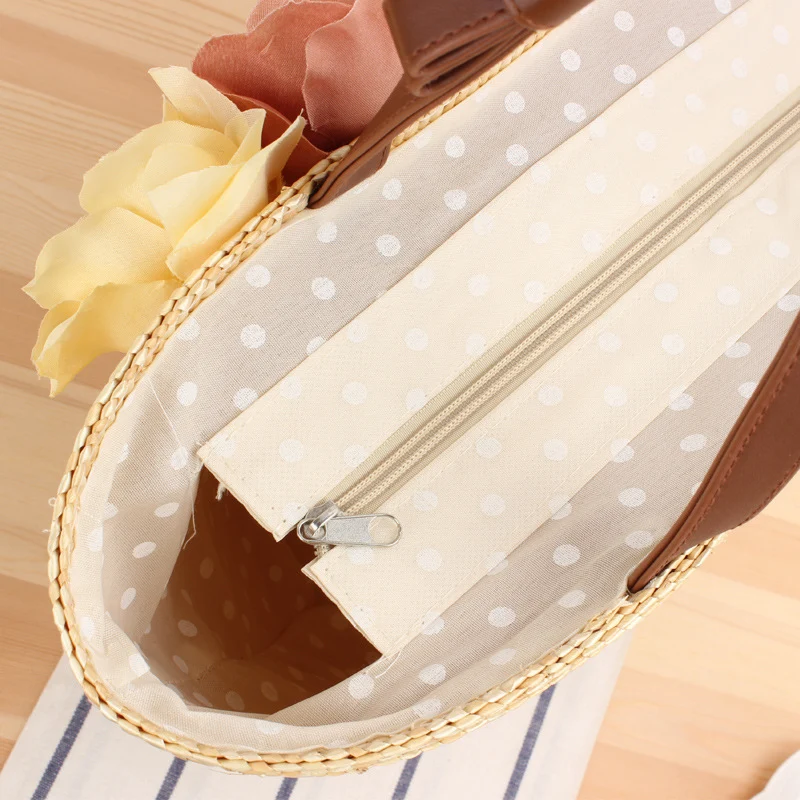 Elegante Strohtasche mit Blumenmotiv Skanto