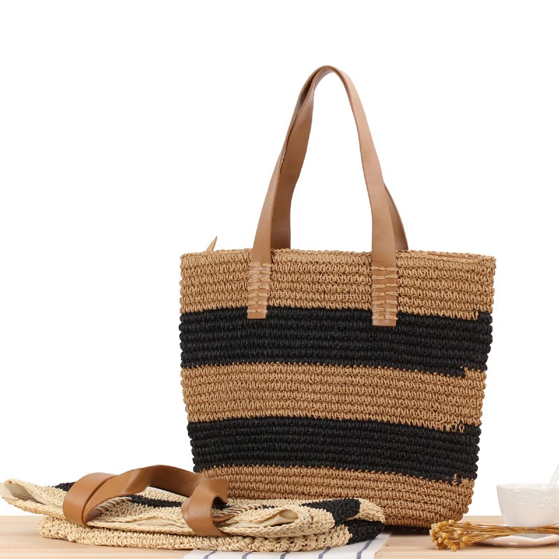 Breite Strohtasche mit eleganten Ledergriffen Skanto