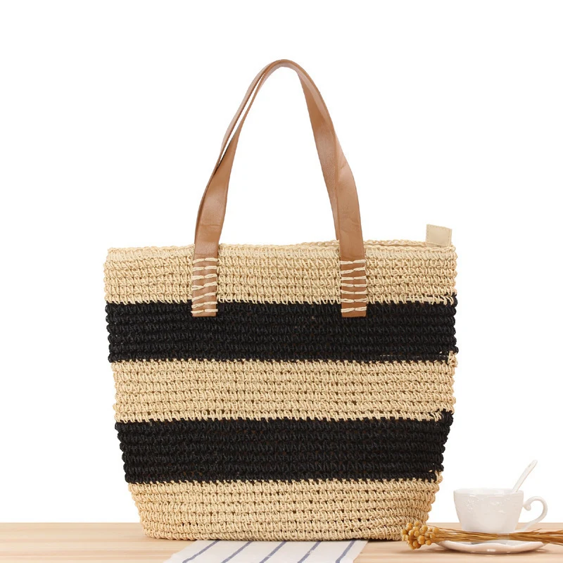 Breite Strohtasche mit eleganten Ledergriffen Skanto